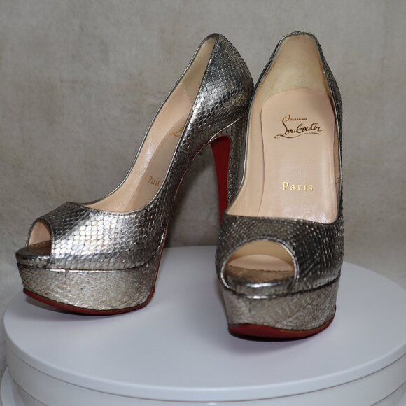 Christian Louboutin Gold Pumps